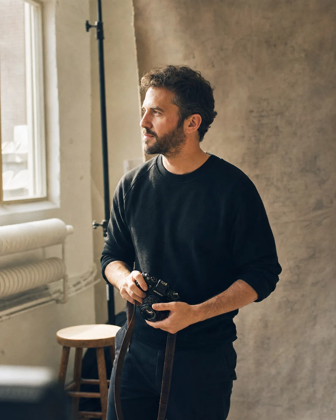 Mara West with a camera